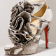 Illustration for article titled Christian Louboutin Creates Sky High, Obscene, Snake Stilettos